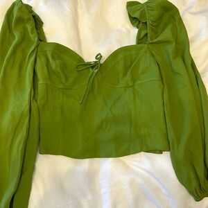 This green top is perfect for summer and from Aritzia. Pairs with jeans/shorts.